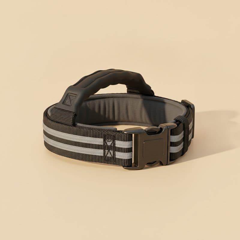 Black tactical dog collar with padded lining and control handle